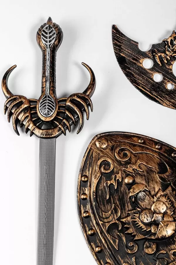 Children's set sword, shield and axe on white background