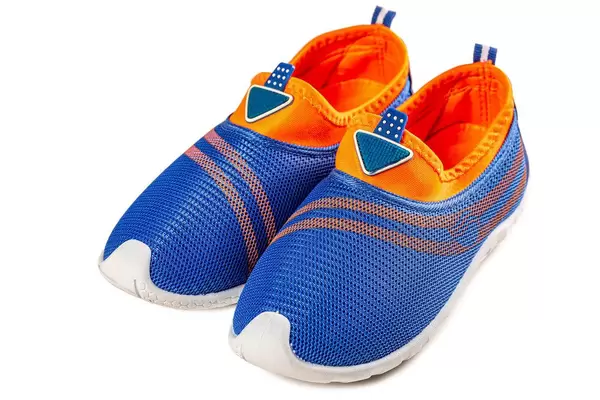 Children's sports sneakers of blue-orange color on white