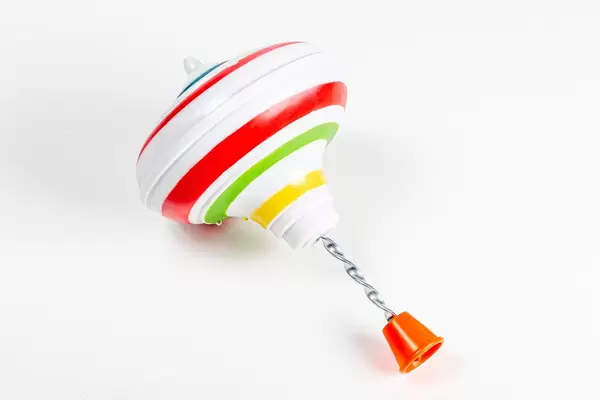 Children's toy whirligig on a white background