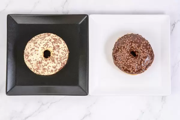 Chocolate and Vanilla Donuts on the square plates
