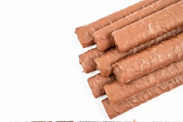 Chocolate Bars above white background with copy space