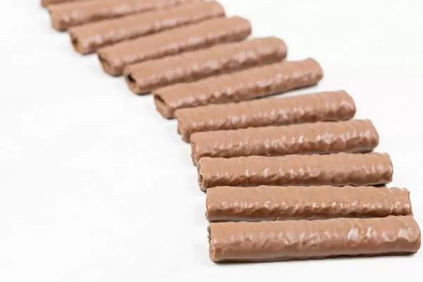 Chocolate Bars aligned as Railroad above white background