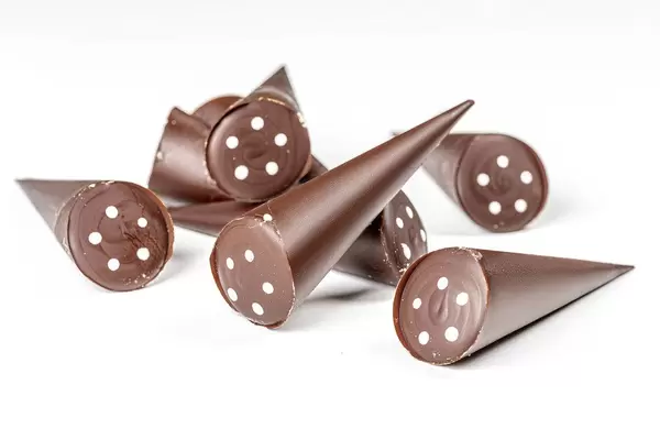 Chocolate candies on a white background (Flip 2020)