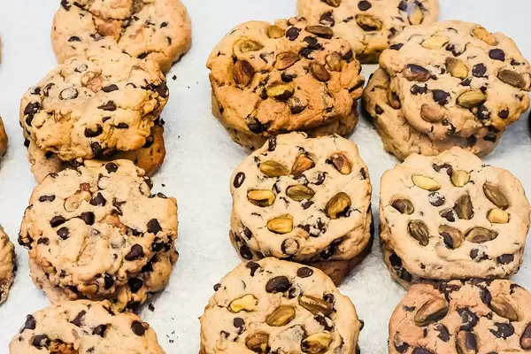 Chocolate chip cookies on white surface