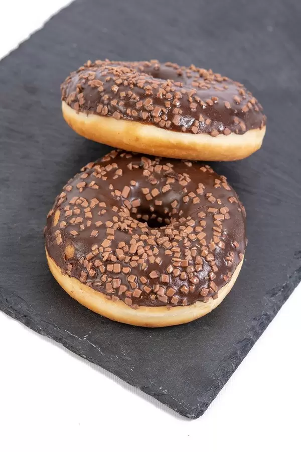 Chocolate Donuts on the black stone tray