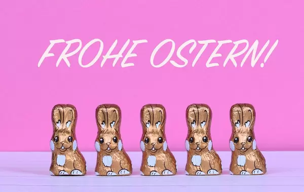 Chocolate Easter bunnies with Frohe Ostern text.jpg
