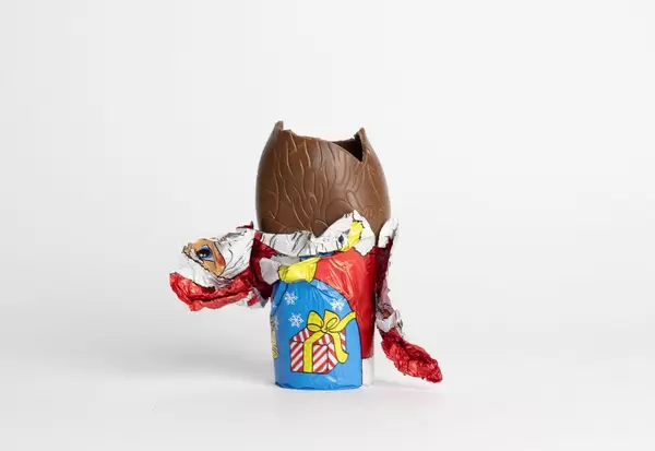 Chocolate figure of Santa Claus being eaten