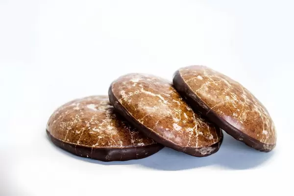 Chocolate ginger cookies on white background