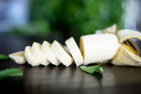 Chopped bannana on a  wodden table