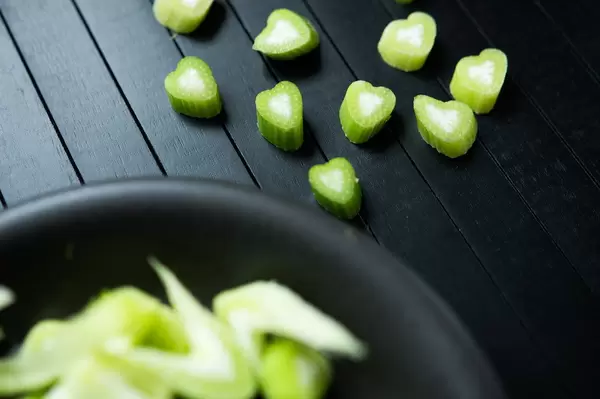 Chopped fennel on a black surface