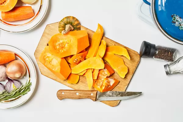 Chopped pumpkin on cutting board