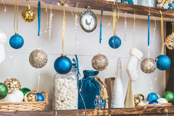 Christmas background with decor and marshmallows in a jar on the shelves