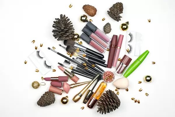 Christmas beauty flat lay with cosmetic gifts for her