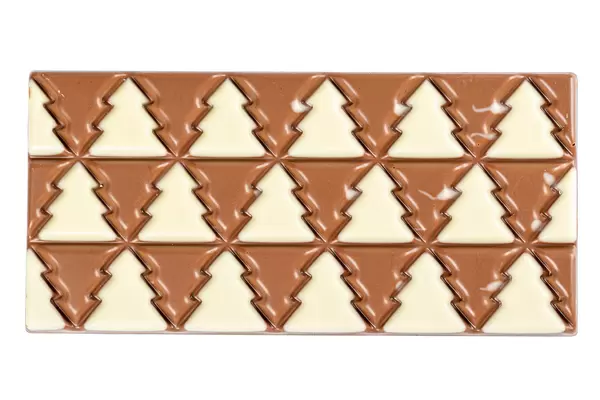 Christmas chocolate bar with christmas trees, top view