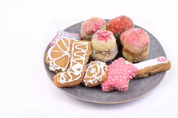 Christmas Cookies on the plate above white background with copy space
