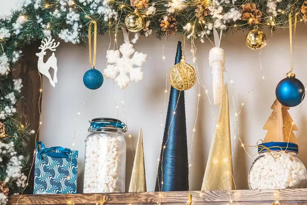 Christmas decor on shelves with garlands