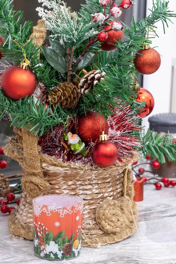 Christmas Decoration tree with red balls and Christmas candle