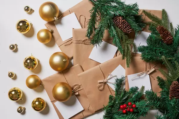 Christmas decorative toys and giftboxes on white