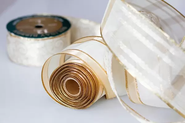 Christmas Golden Ribbon on a White Background