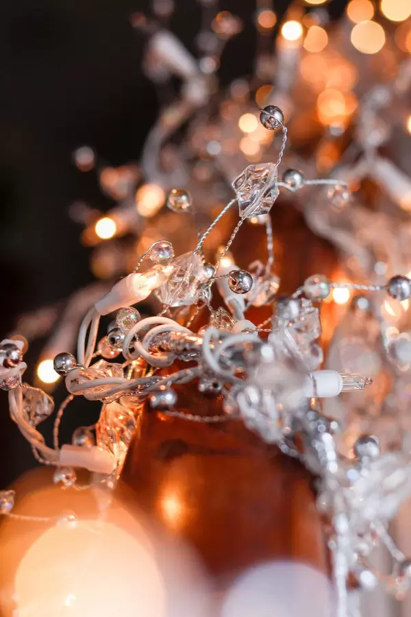 Christmas Lights Background with the Silver Ornament