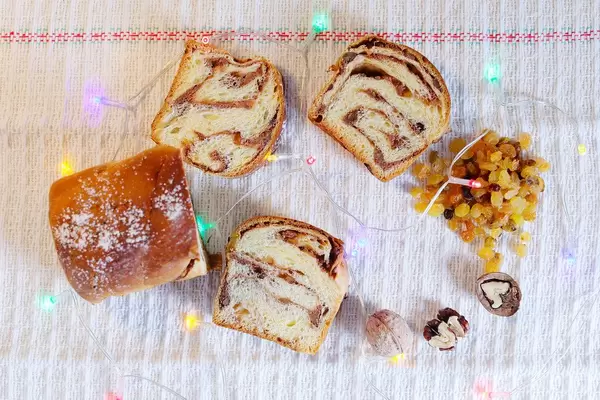Christmas sponge cake with raisins and nuts