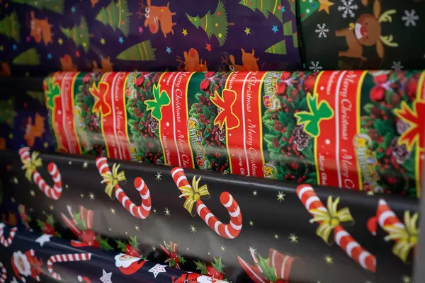 Christmas Themed Wrapping Paper for Gifts with Sugar Canes, Christmas Stars and other Designs