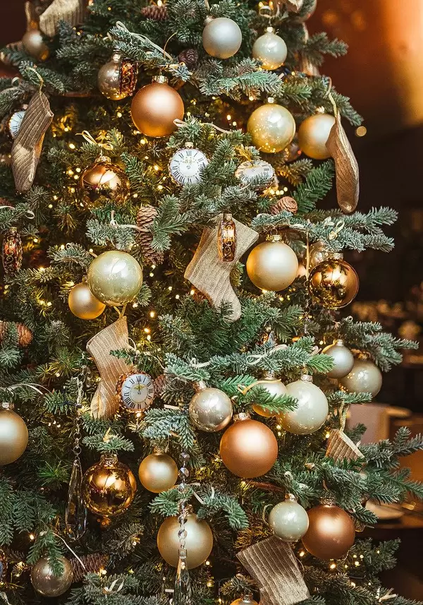 Christmas Tree With Golden Balls, Socks And Clocks