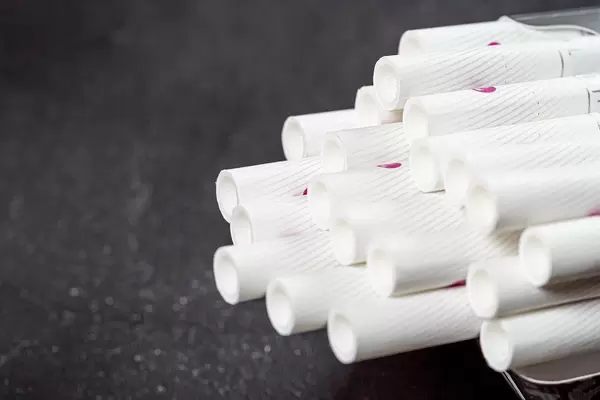 Cigarettes with filter closeup. The concept of harm to health (Flip 2019)