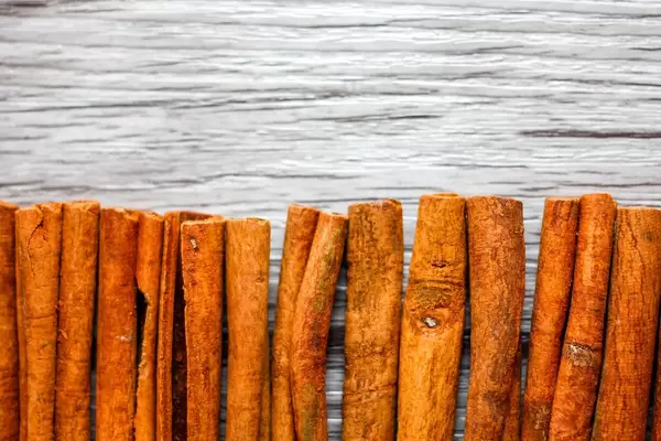 Cinnamon Stick on a Wooden Baclground