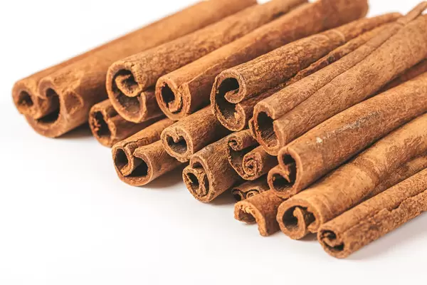 Cinnamon sticks on white background