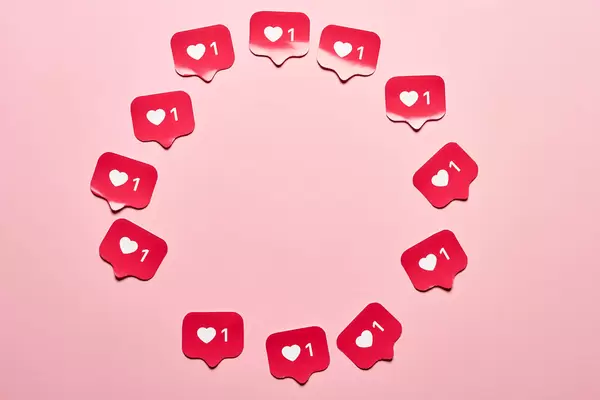 Circle made from paper cut Instagram love icons