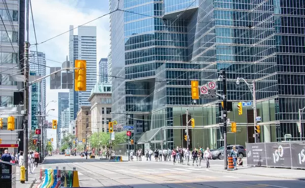City Street with Light and Glass Building