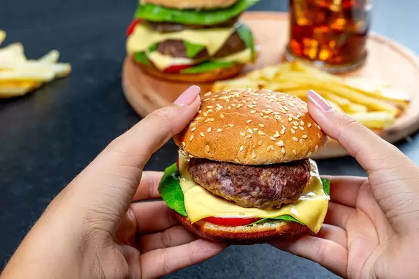 Classic Burger with cutlet and cheese in hand (Flip 2019)
