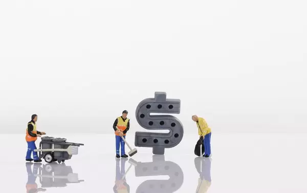 Cleaning workers with Dollar sign on white background
