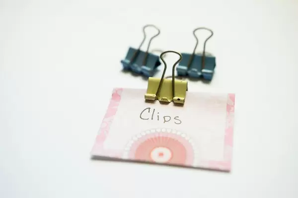 Clip holding a paper