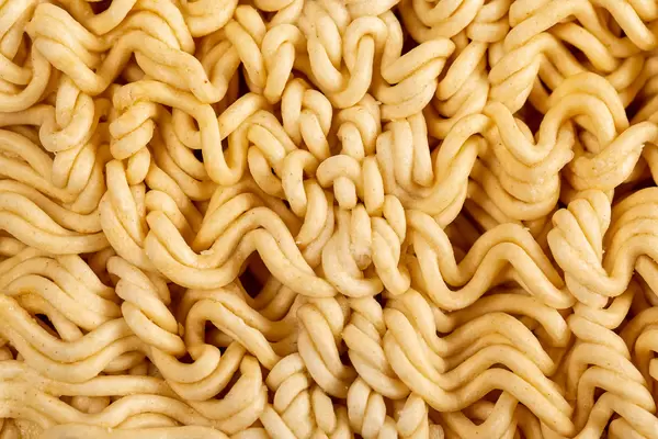 Close-up, background texture of raw instant noodles