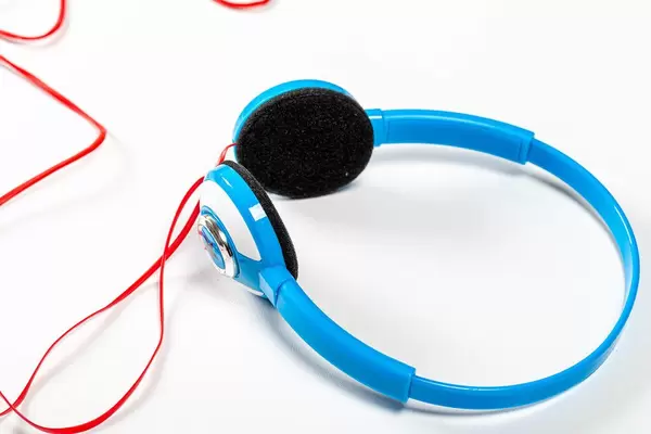 Close up blue headphones with red cords (Flip 2019)