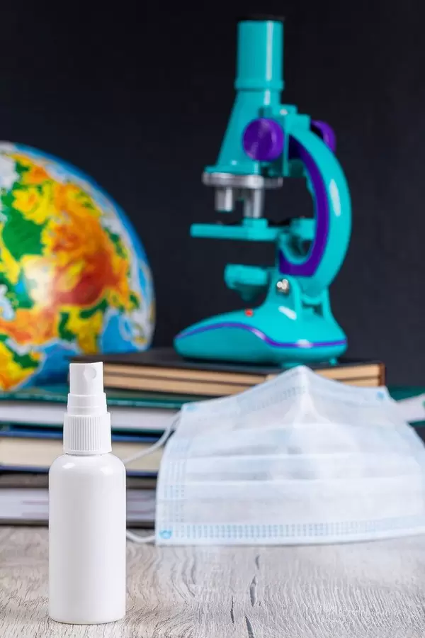 Close-up, bottle of antiseptic on school background