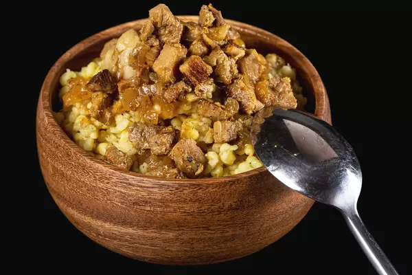 Close-up, bulgur porridge with meat gravy