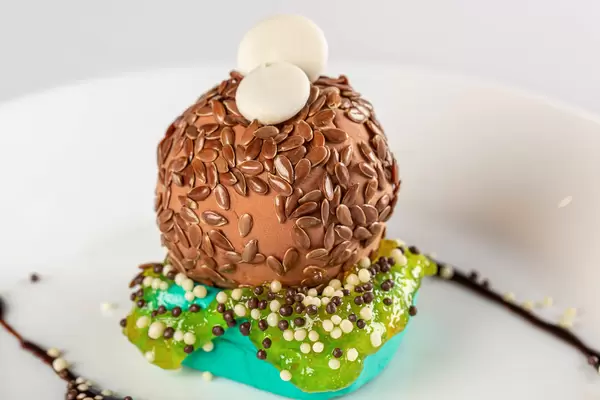 Close-up, chocolate dessert with flaxseed and mastic