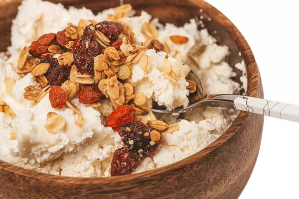 Close-up, cottage cheese with dried berries and oatmeal