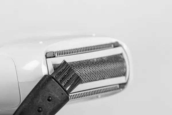 Close-up, epilator cleaning brush