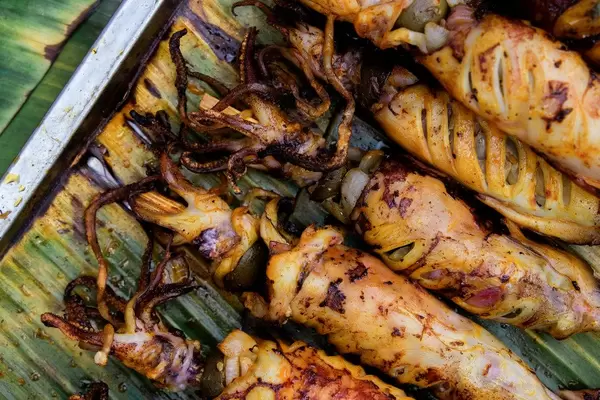 Close up flatlay of grilled squid (Flip 2019)