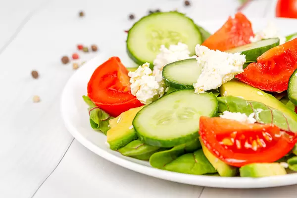 Close-up, fresh vegetable salad with cottage cheese