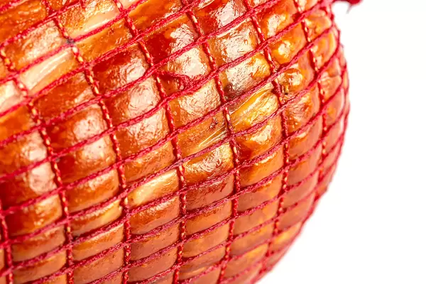 Close-up, ham sealed in a net
