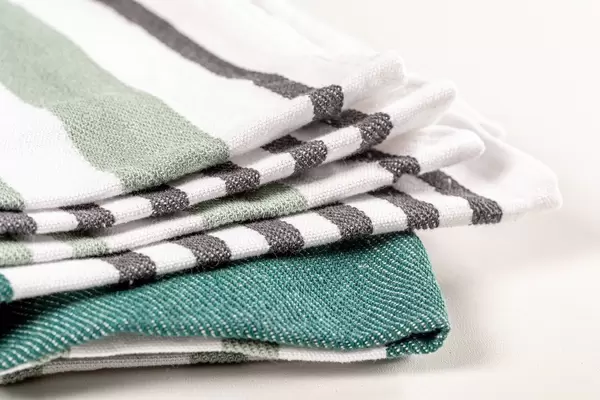 Close-up, kitchen towel with green and gray stripes
