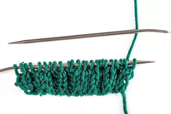 Close-up, knitting. The concept of needlework