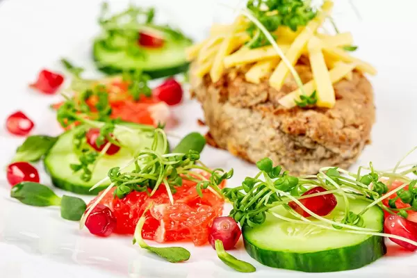 Close up lunch with fresh vegetables, fruits, cheese and cutlet (Flip 2020)