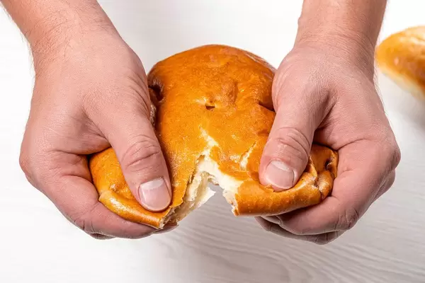 Close up male hands breaking fresh khachapuri (Flip 2019)