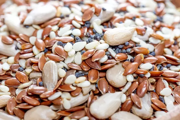 Close - up mix of flax, sunflower, sesame and poppy seeds